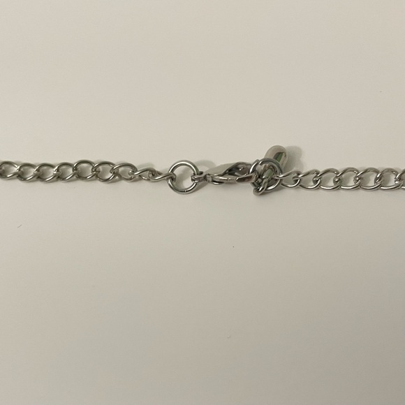 Silver Tone Rotating Evil Eye Charms Necklace - Picture 8 of 15